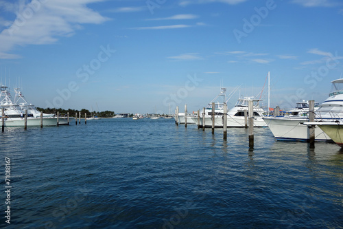 Fishing boats waiting at the marina photo