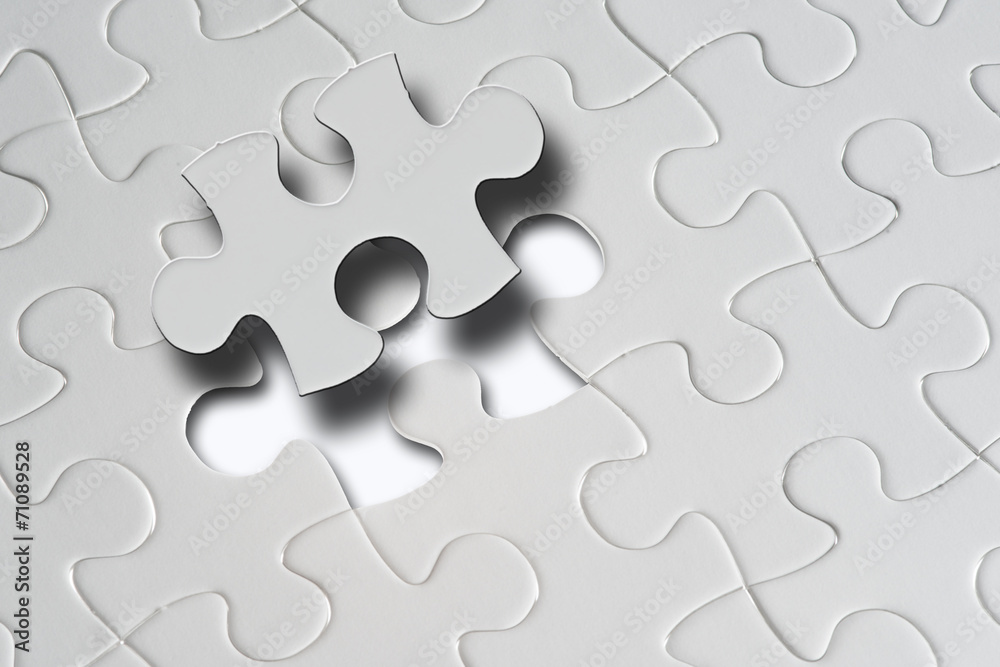 Missing jigsaw puzzle piece with light glow, business concept Missing jigsaw puzzle piece with light glow, business concept