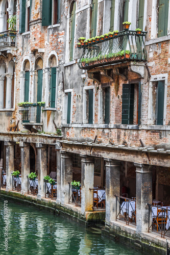 Beautiful view on the Venice city in Italy with canal photo