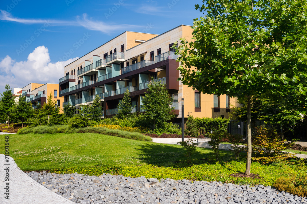 Newly built block of flats with public green area around