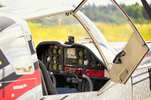 Control panel in the small cockpit of a microlight plane © dojo666