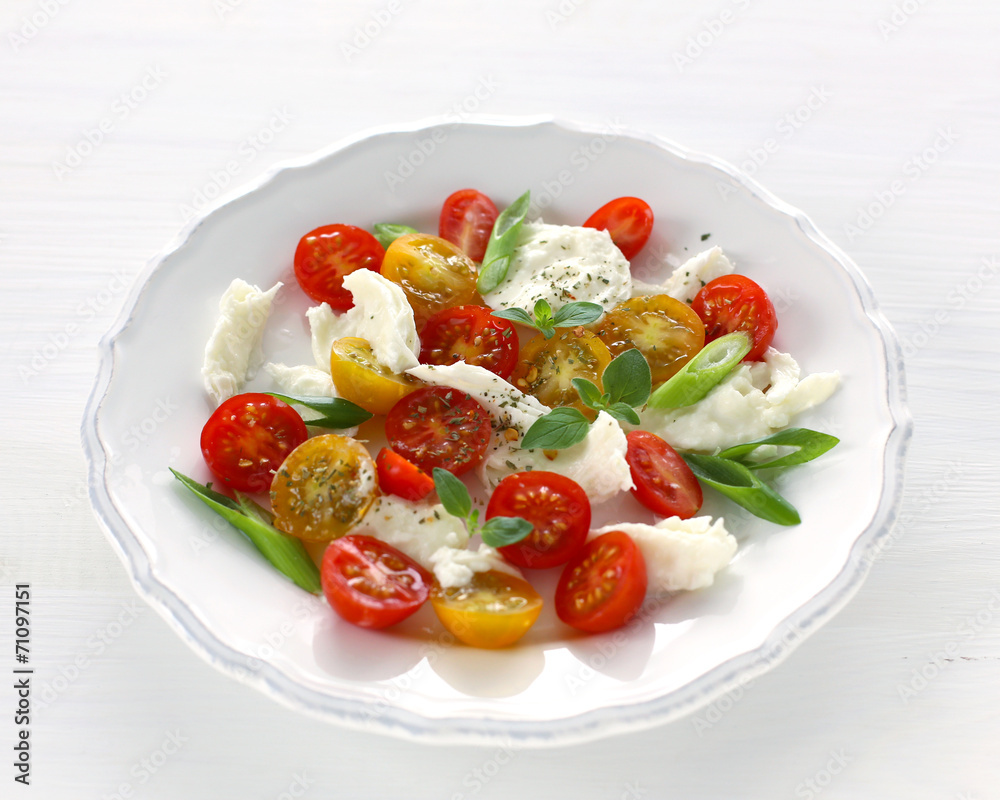 Mozzarella, red and yellow cherry tomatoes