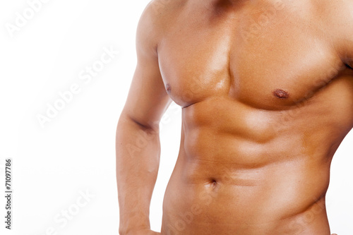 Fit young man with beautiful torso, isolated on white background