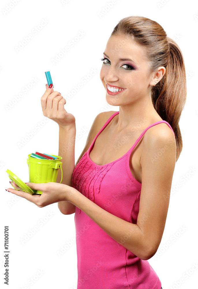Young girl sorting battery isolated on white Young girl sorting battery isolated on white