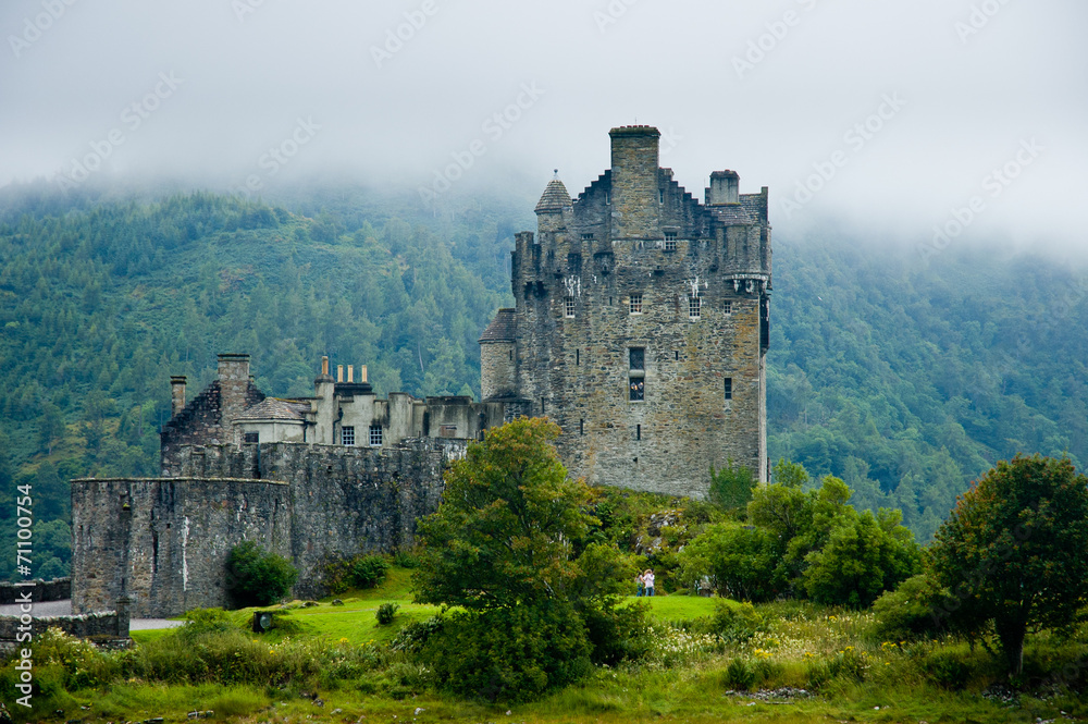 Eilean Donan castle in the clouds Scotland