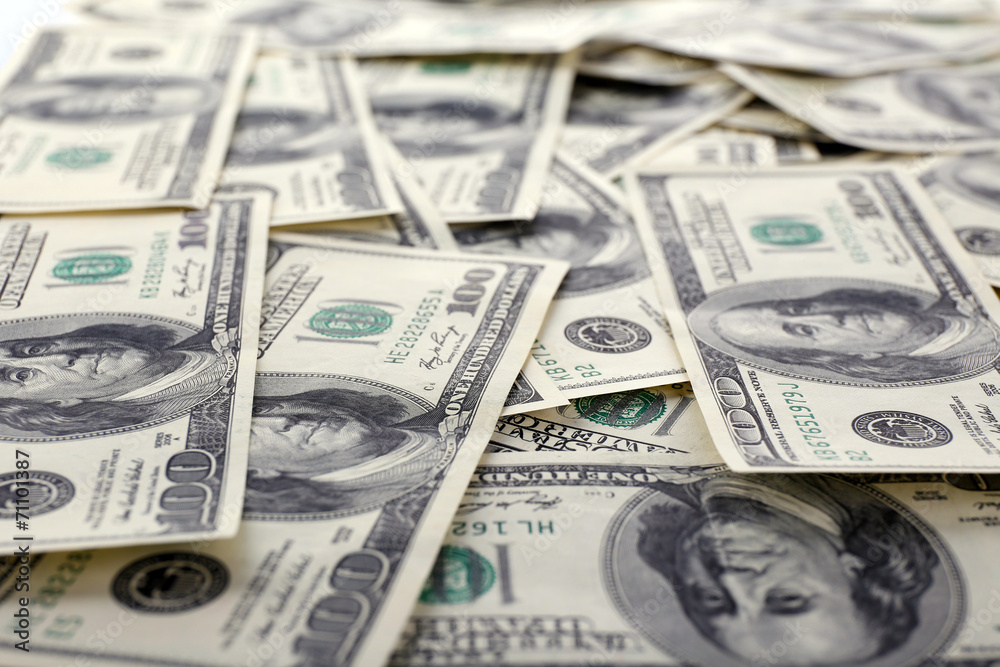 Lot of one hundred dollar bills close-up background Lot of one hundred dollar bills close-up background