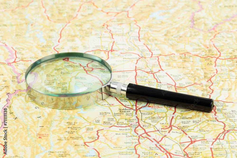 Magnifier on a road map Magnifier on a road map