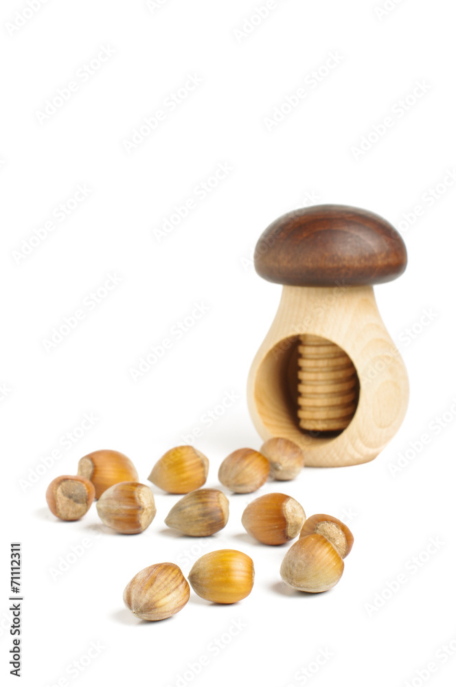 Nut cracker with hazelnuts isolated Nut cracker with hazelnuts isolated