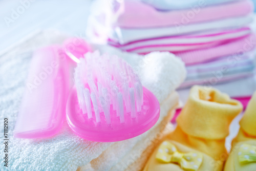 hairs brushes and baby clothes