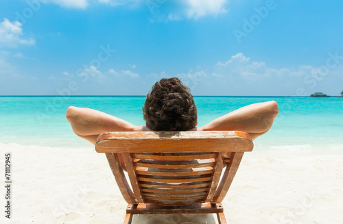 Man relaxing on beach