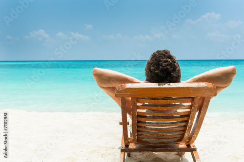 Man resting on the beach