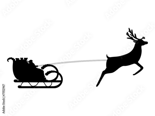 Santa Claus rides in a sleigh in harness on the reindeer