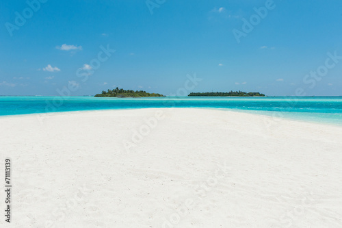 Two islands in the ocean  beach with white sand and blue water