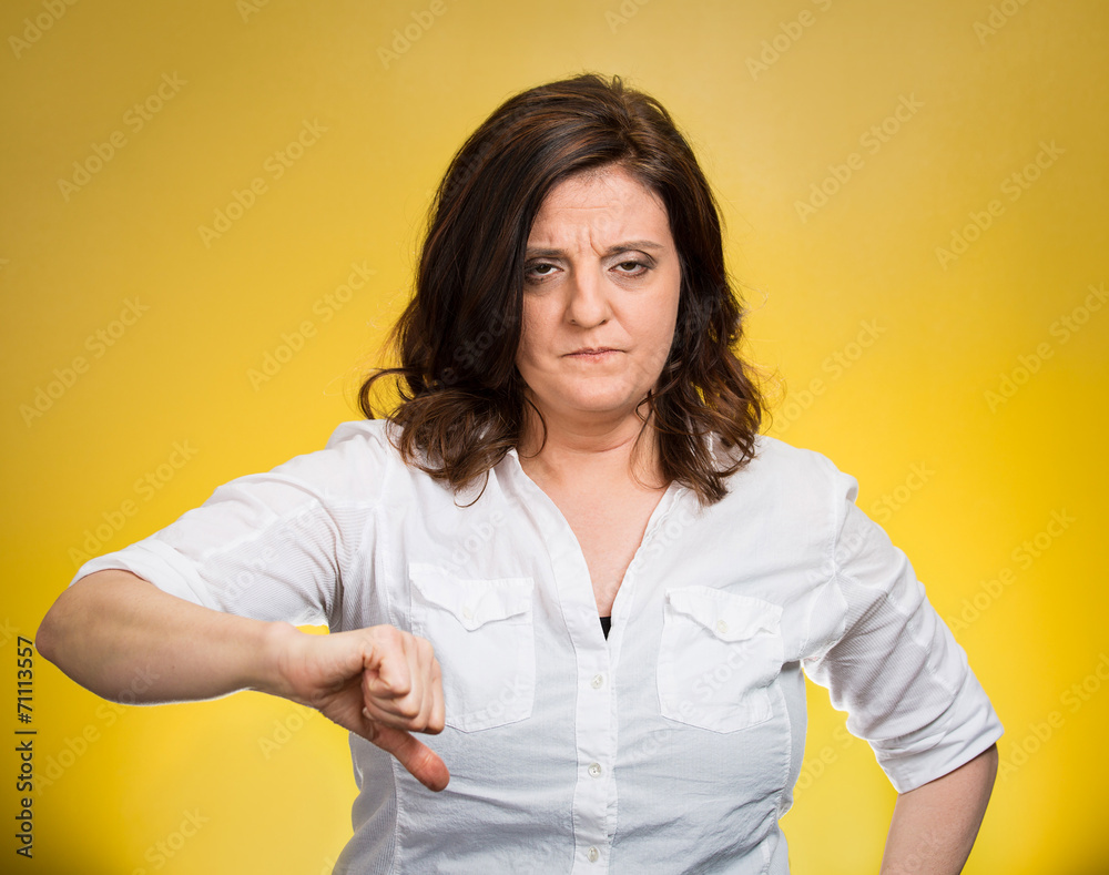 pissed off angry woman, giving thumb down yellow background pissed off angry woman, giving thumb down yellow background