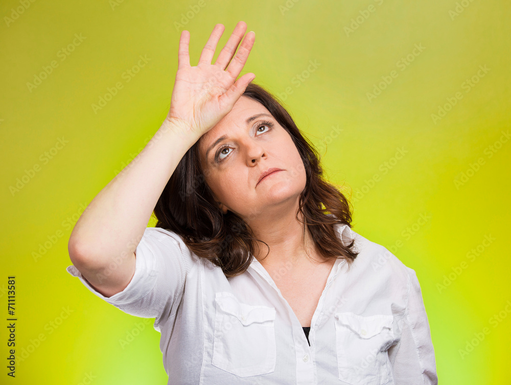 annoyed tired middle aged woman on green background annoyed tired middle aged woman on green background