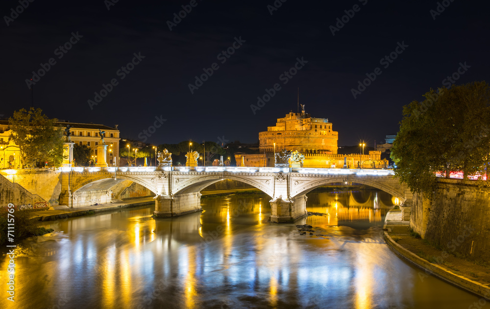 Night view of Castle Sant Angelo and river Tiber in Roma. Italy