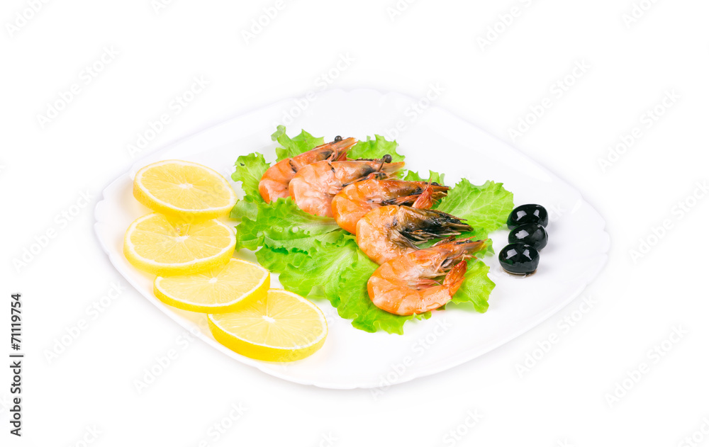 Boiled shrimps with olives and sliced lemon. Boiled shrimps with olives and sliced lemon.