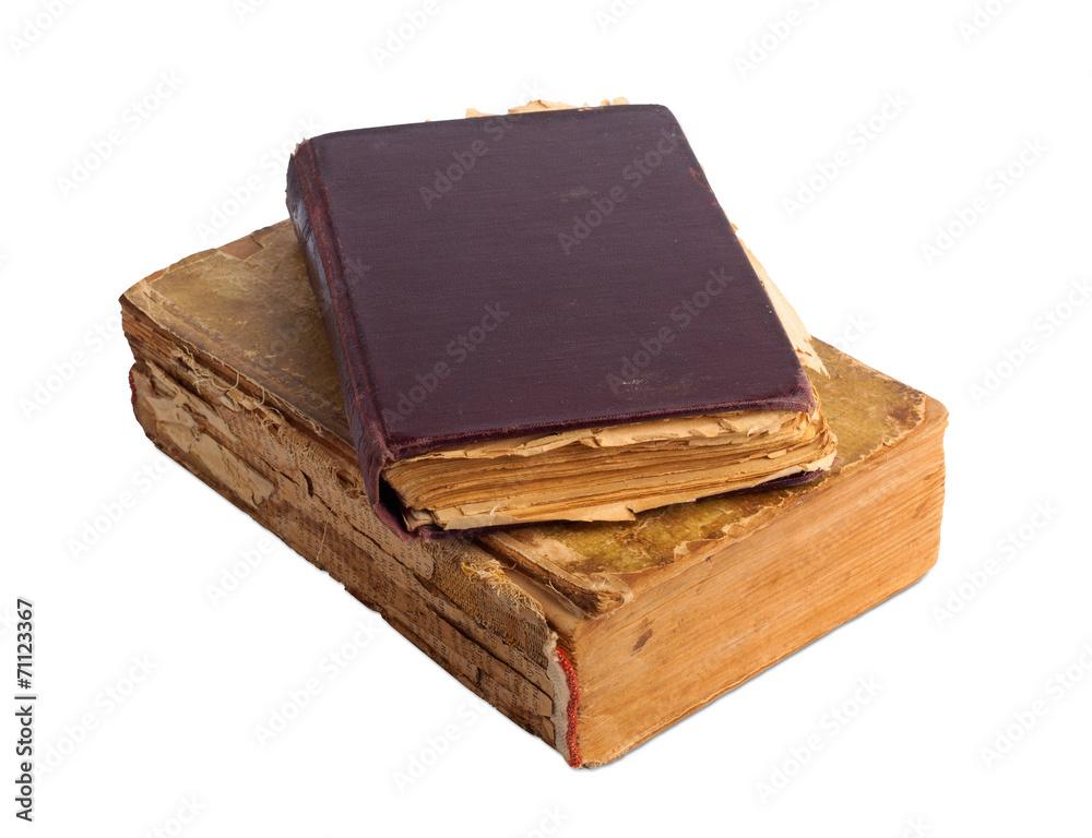 A stack of old books with gold stamping on a white background is A stack of old books with gold stamping on a white background is