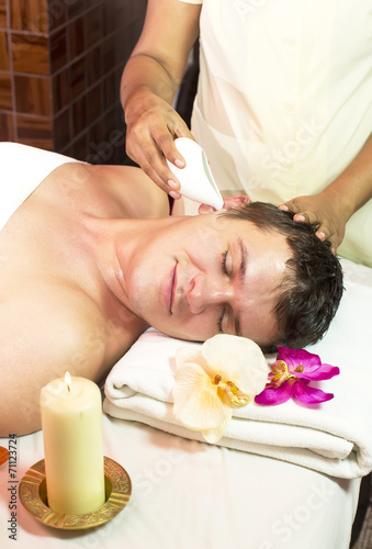 man engaged in Ayurvedic spa treatment