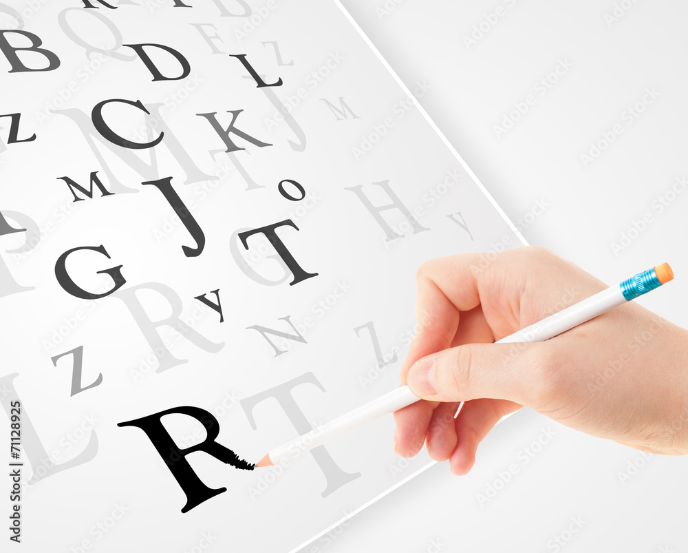 Hand writing various letters on white plain paper Hand writing various letters on white plain paper