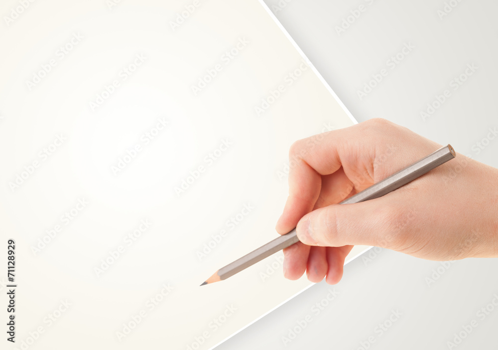 Human hand drawing with pencil on empty paper template Human hand drawing with pencil on empty paper template
