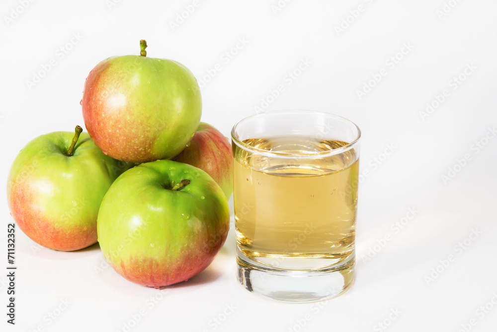 Glass with juice and apples Glass with juice and apples