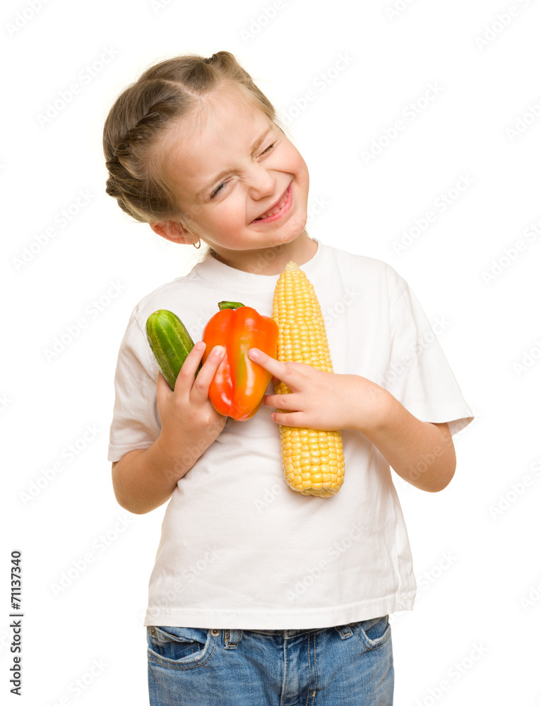 little girl with fruits and vegetables on white little girl with fruits and vegetables on white