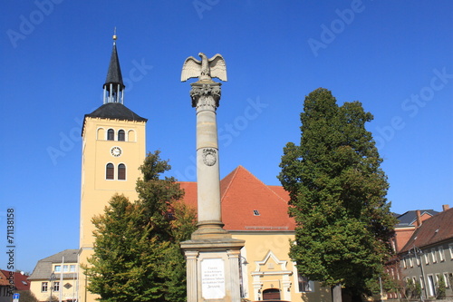 Markt mit Nicolaikirche und Kriegerdenkmal in Jessen/ Elster photo