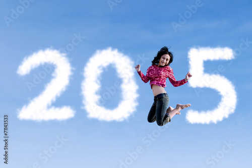 Woman flying and forming number 2015