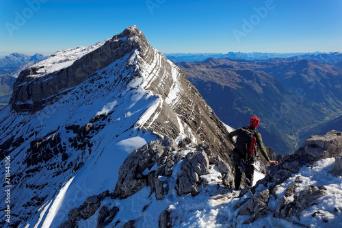 Mountain climber on Vrenelisgärtli summit (Verena's Little Garden), Swiss Alps, Switzerland, Europe