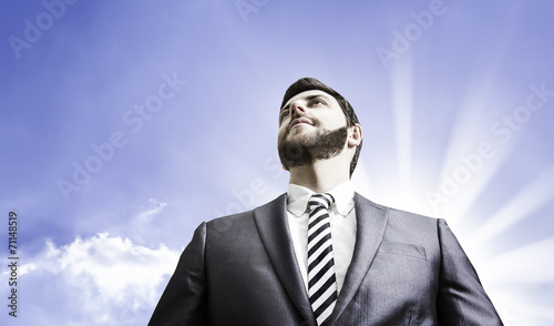 Business man on sky background photo