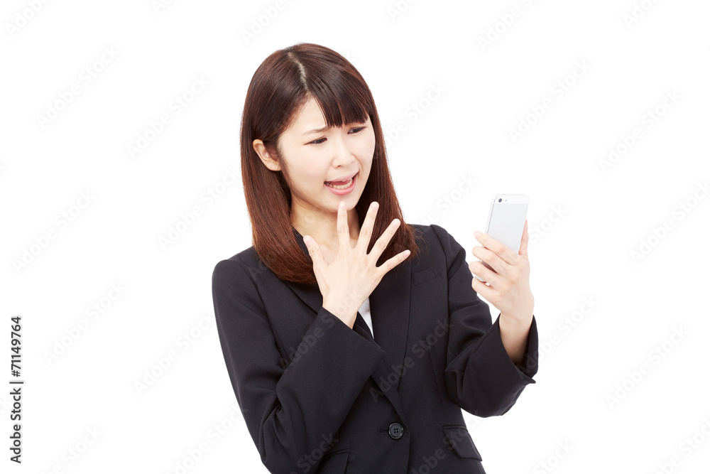 スマートフォンを持って困るビジネスウーマン スマートフォンを持って困るビジネスウーマン