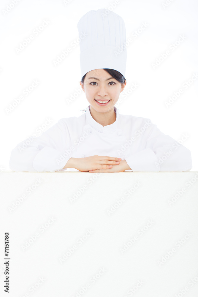 看板を持った女性シェフ 看板を持った女性シェフ