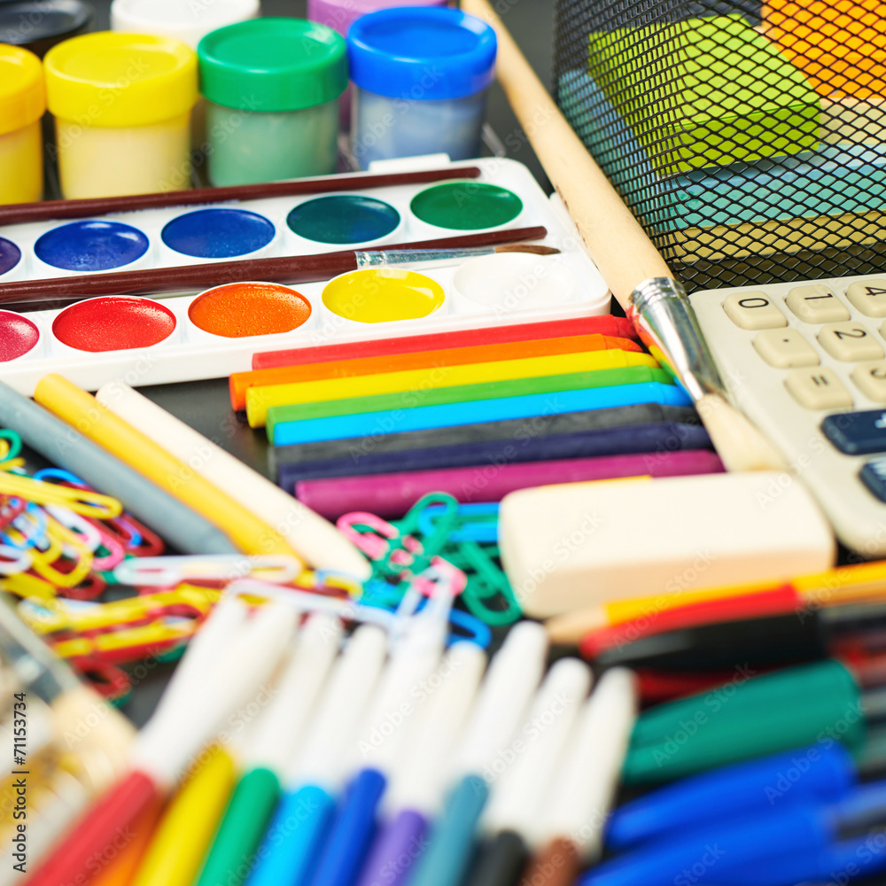 Desk covered with multiple stationery Desk covered with multiple stationery