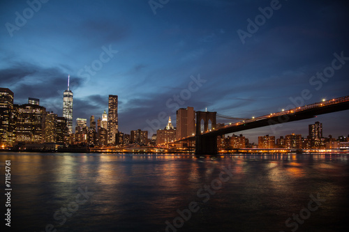 Skyline New York and Brooklyn bridge at night