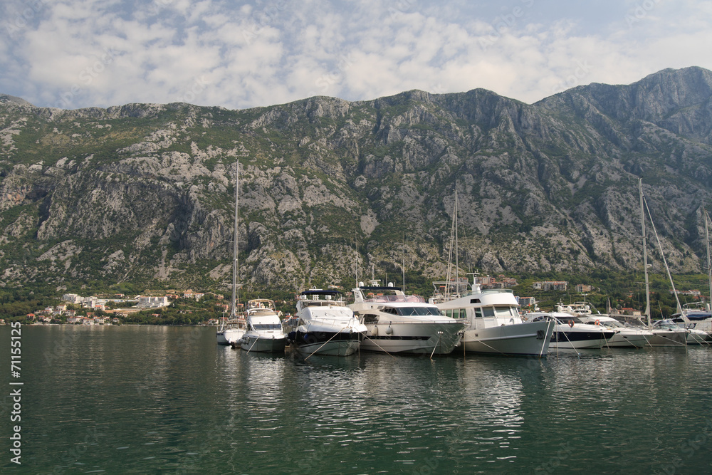 Small yacht in the Bay of Kotor in Montenegro Small yacht in the Bay of Kotor in Montenegro
