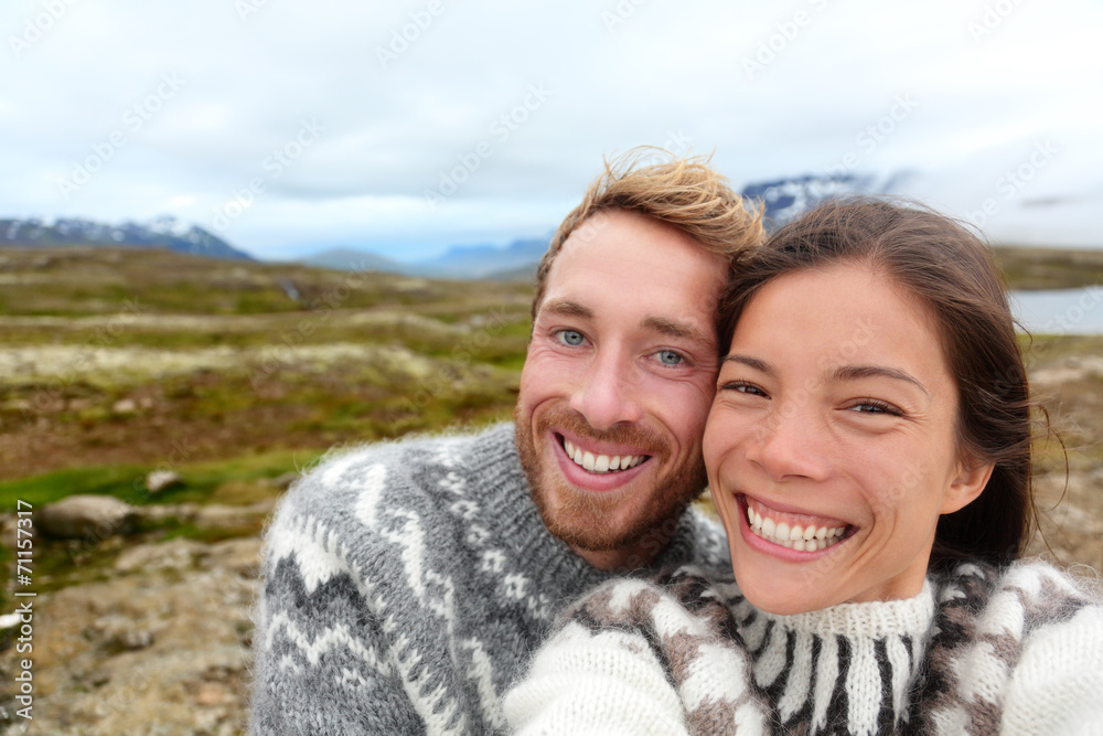 Iceland couple selfie wearing Icelandic sweaters Iceland couple selfie wearing Icelandic sweaters