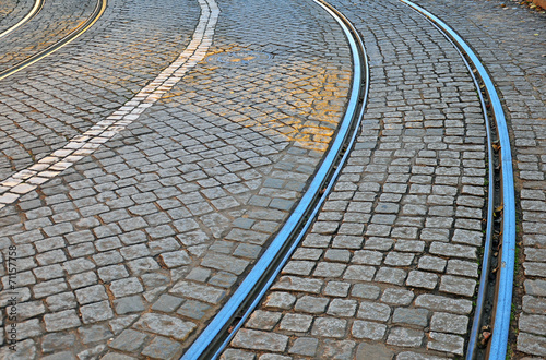 Road with tiled floor and tram lines