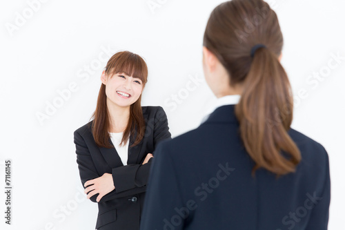 asian businesswomen talking on white background