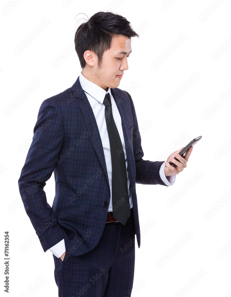Asian businessman look at cellphone