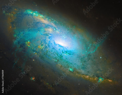 Galaxy outburst with stellar material.