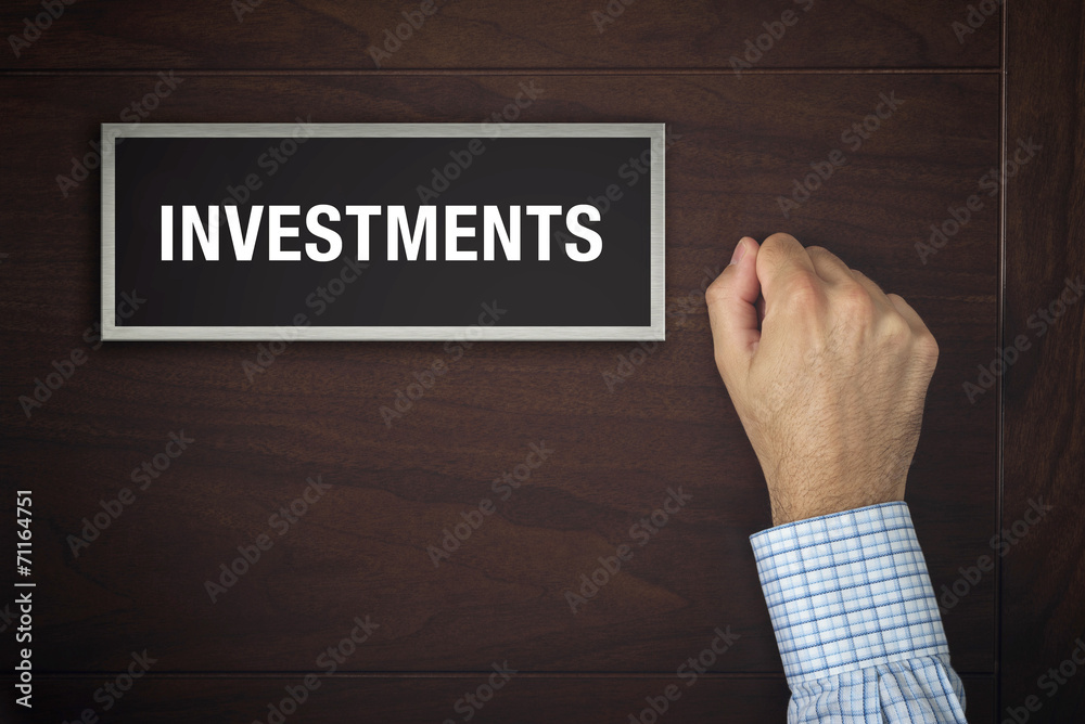 Hand is knocking on Investments door Hand is knocking on Investments door