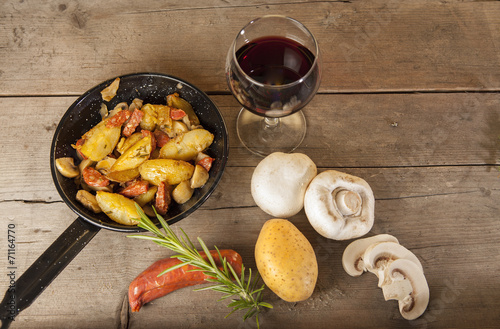 Spanish tapas presented on a wooden floor