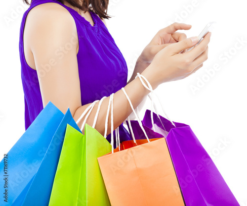 close-up shot of a person holding and touching a cell phone