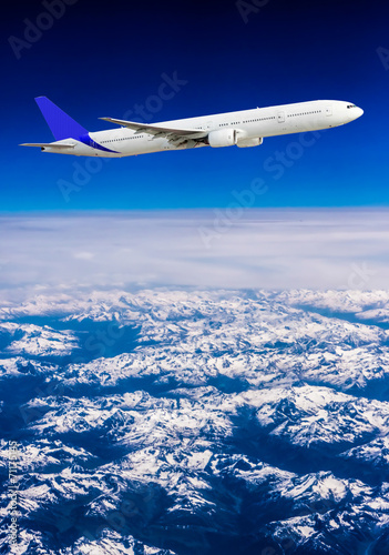 Fototapeta Naklejka Na Ścianę i Meble -  aeroplane.  Airplane over the mountains