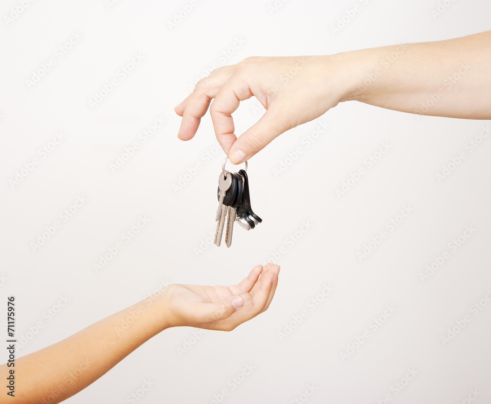mother gives the keys to his little daughter mother gives the keys to his little daughter