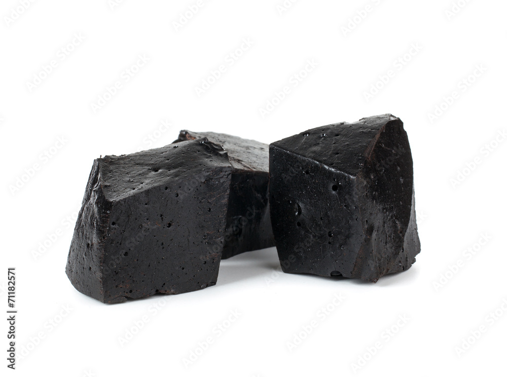 Pure blocks of licorice . Pure blocks of licorice .
