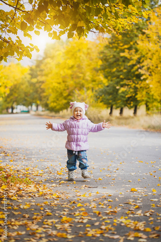 happy playful baby in the autumn park © Dmytro Titov