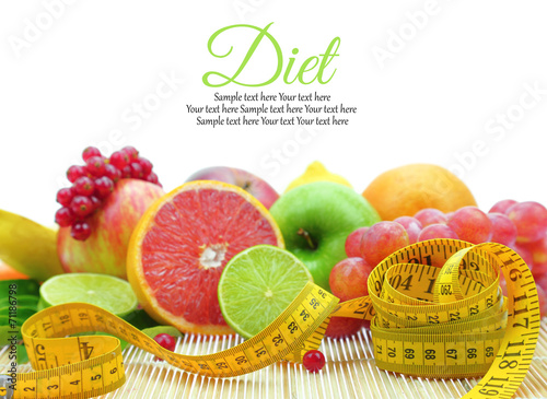Fresh fruit slices and measuring tape