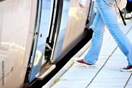 Photography Commuter enters train